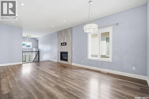 219 Ells Crescent, Saskatoon, SK - Indoor With Fireplace