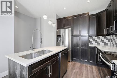 219 Ells Crescent, Saskatoon, SK - Indoor Photo Showing Kitchen With Double Sink With Upgraded Kitchen