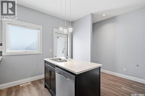219 Ells Crescent, Saskatoon, SK - Indoor Photo Showing Kitchen With Double Sink