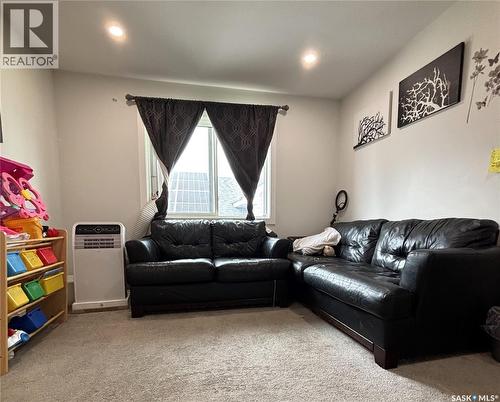 254 Aniskotaw Manor, Saskatoon, SK - Indoor Photo Showing Living Room