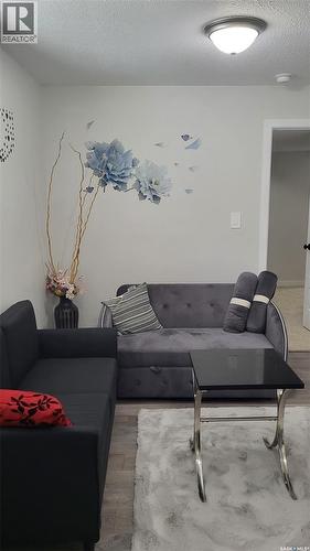 254 Aniskotaw Manor, Saskatoon, SK - Indoor Photo Showing Living Room