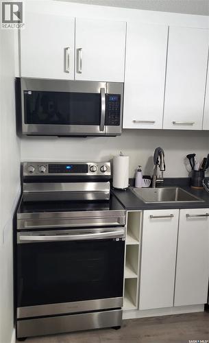 254 Aniskotaw Manor, Saskatoon, SK - Indoor Photo Showing Kitchen With Double Sink