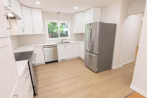 5 Cauchon Rd, Pinawa, MB - Indoor Photo Showing Kitchen With Double Sink
