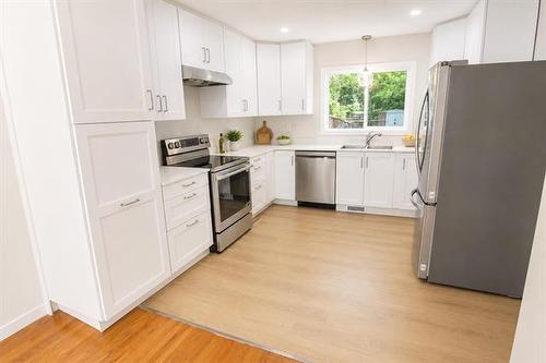 5 Cauchon Rd, Pinawa, MB - Indoor Photo Showing Kitchen With Double Sink