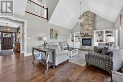 Family room with stone facade on fireplace - 