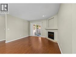 Walkout to the private patio and fenced yard - 
