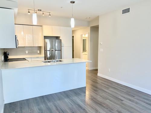9907 91 Avenue, Edmonton, AB - Indoor Photo Showing Kitchen With Double Sink
