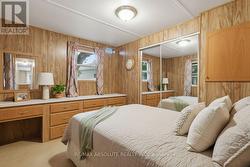 Primary Bedroom (*This photo is virtually staged) - 