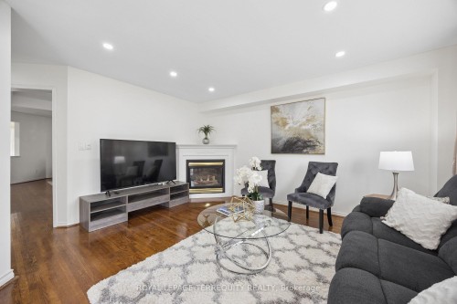 7339 Black Walnut Trail, Mississauga, ON - Indoor Photo Showing Living Room With Fireplace