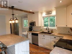 KITCHEN MAIN FLOOR- WINDOW OVERLOOKING YARD - 