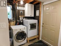 LOWER LEVEL LAUNDRY AREA - 