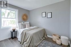 Second bedroom with large window and closet - 