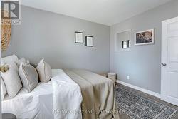 Second bedroom with large window and closet - 