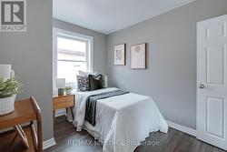 Third bedroom with large window and closet - 