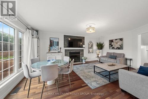 Family room with wood fireplace - 29 Depper Place, Ottawa, ON 