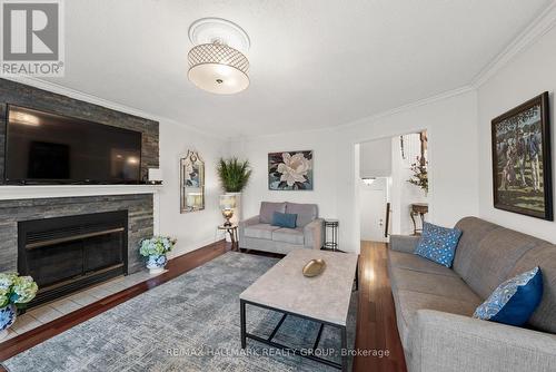 Family room with wood fireplace - 29 Depper Place, Ottawa, ON 