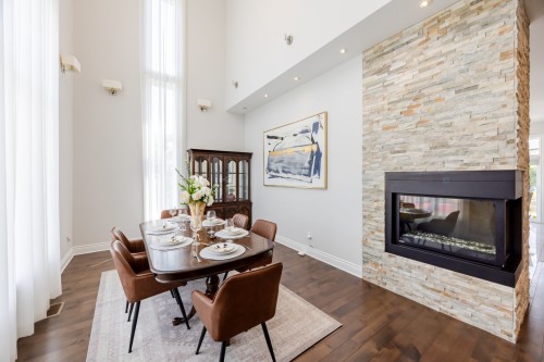 Salle à manger - 4110 Rue De Louviers, Brossard, QC - Indoor Photo Showing Other Room With Fireplace