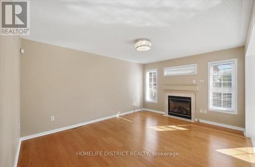 901 Bennett Boulevard, Milton, ON - Indoor Photo Showing Living Room With Fireplace