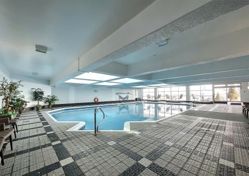 Pool - 504-15 Rue Des Émeraudes, Repentigny (Repentigny), QC - Indoor Photo Showing Other Room With In Ground Pool