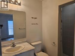 Bathroom with vanity and a shower stall - 