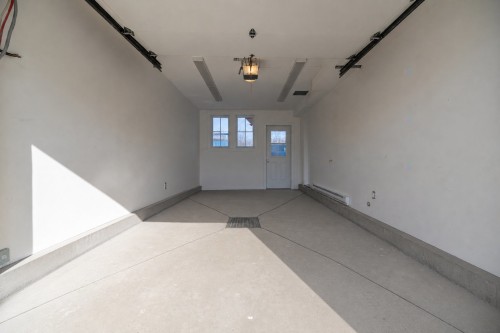 Garage - 5 Av. St-Jean-Baptiste, Pointe-Claire, QC - Indoor Photo Showing Other Room