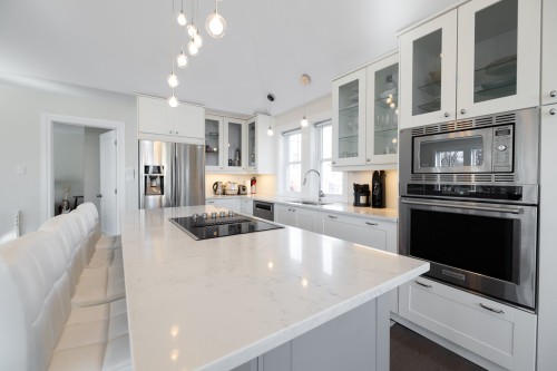 Kitchen - 5 Av. St-Jean-Baptiste, Pointe-Claire, QC - Indoor Photo Showing Kitchen With Upgraded Kitchen