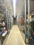 Dedicated storage units featuring metal caging and concrete flooring - 