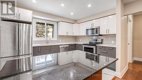 36 - 250 Bridletowne Circle, Toronto, ON - Indoor Photo Showing Kitchen With Upgraded Kitchen