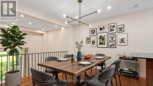 virtually staged dining room - 36 - 250 Bridletowne Circle, Toronto, ON - Indoor Photo Showing Dining Room