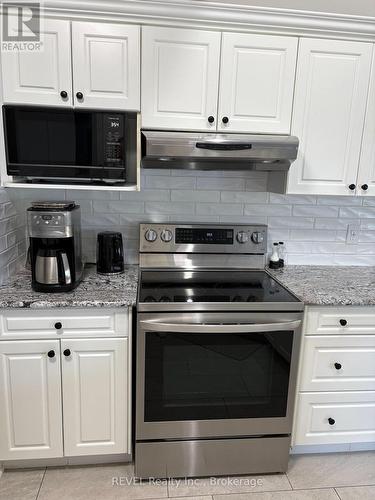 Updated Backsplash - 16 Maracay Way, St. Catharines (Grapeview), ON - Indoor Photo Showing Kitchen With Upgraded Kitchen