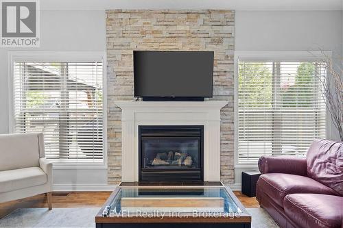 16 Maracay Way, St. Catharines (Grapeview), ON - Indoor Photo Showing Living Room With Fireplace