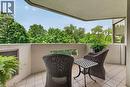 Outdoor balcony featuring light-toned tile flooring and a solid perimeter wall - 1237 North Shore Boulevard, Burlington, ON 