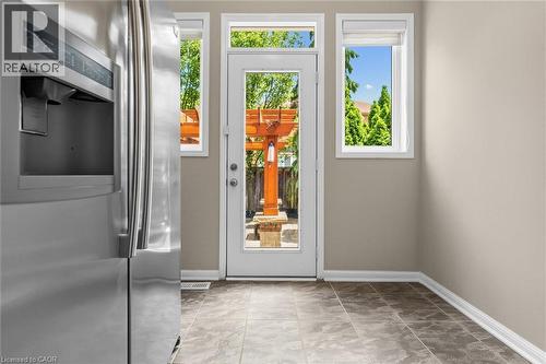 Stainless steel refrigerator with a built-in dispenser - 729 Boughton Crescent, Milton, ON 