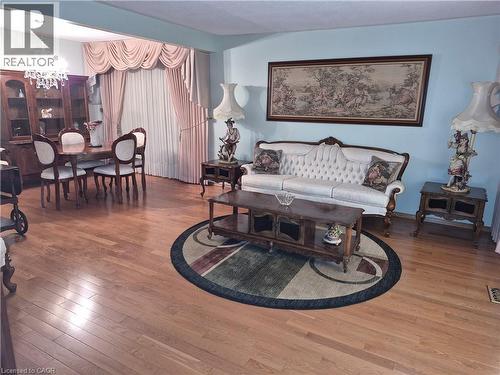Hardwood flooring - 11 Fassett Avenue, Hamilton, ON - Indoor Photo Showing Living Room