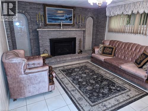 11 Fassett Avenue, Hamilton, ON - Indoor Photo Showing Living Room With Fireplace