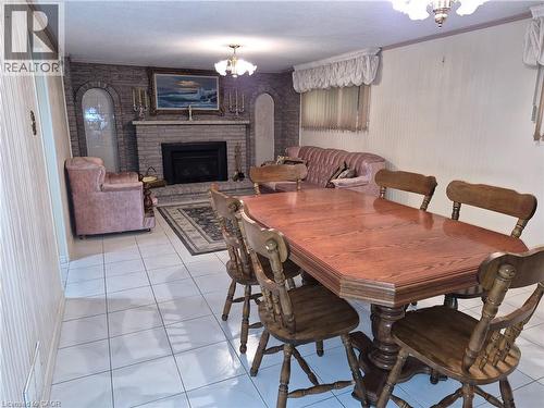 11 Fassett Avenue, Hamilton, ON - Indoor Photo Showing Dining Room With Fireplace