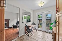Patio doors in breakfast area lead to rear deck. - 