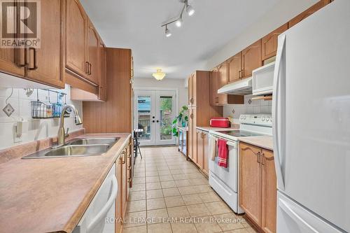 Ample natural light in Kitchen from patio doors. - 70 College Circle, Ottawa, ON 