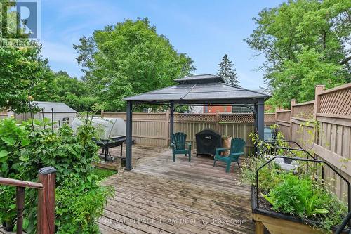Lounge area on deck overlooks fenced backyard. - 70 College Circle, Ottawa, ON 