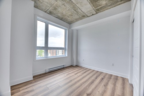 Chambre à coucher - W704-8510 Rue Jean-Nicolet, Montréal (Saint-Léonard), QC - Indoor Photo Showing Other Room