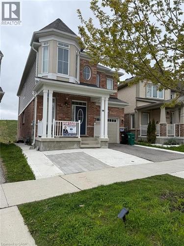 Brick facade with a prominent turret feature - 63 Ridge Road Unit# Upper, Cambridge, ON 