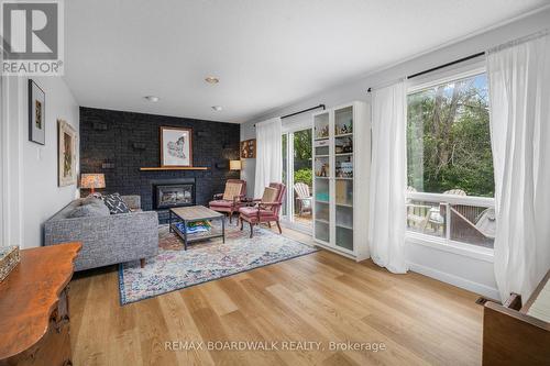 8 Jessie Drive, Perth, ON - Indoor Photo Showing Living Room With Fireplace