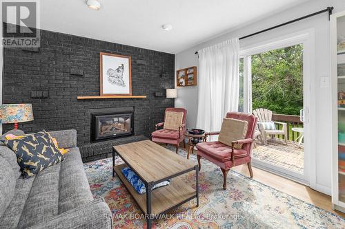 8 Jessie Drive, Perth, ON - Indoor Photo Showing Living Room With Fireplace