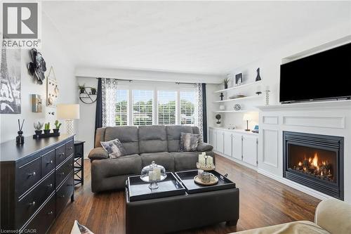33 Centennial Parkway S, Hamilton, ON - Indoor Photo Showing Living Room With Fireplace