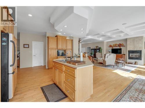 134 Deerview Crescent, Princeton, BC - Indoor Photo Showing Kitchen With Fireplace With Double Sink