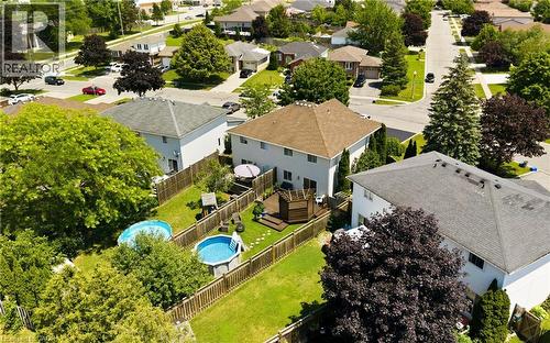 Aerial perspective showcasing a residential neighborhood with detached homes - 16 Scottacres Boulevard, Caledonia, ON 