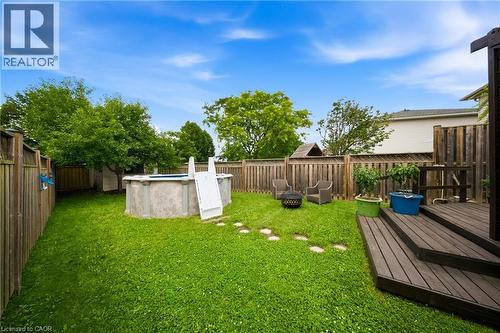 Yard - 16 Scottacres Boulevard, Caledonia, ON - Outdoor With Above Ground Pool With Backyard