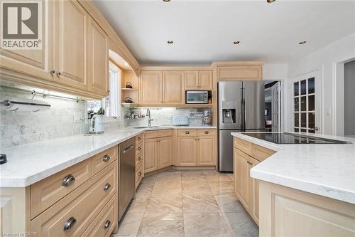 Kitchen view toward dining room - 18 Stonegate Drive, Hamilton, ON 