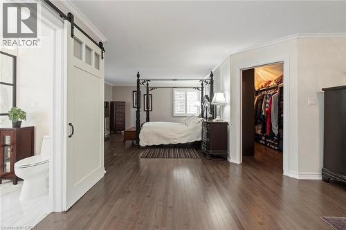 Primary Bedroom with walk in closet and ensuite bath - 18 Stonegate Drive, Hamilton, ON 