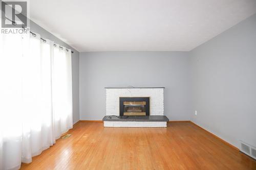 74 Grandriver Cres, Sault Ste. Marie, ON - Indoor Photo Showing Living Room With Fireplace